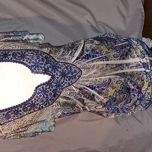 This is a dressy short sleeve 1x sized pretty top.brand is energ world wear